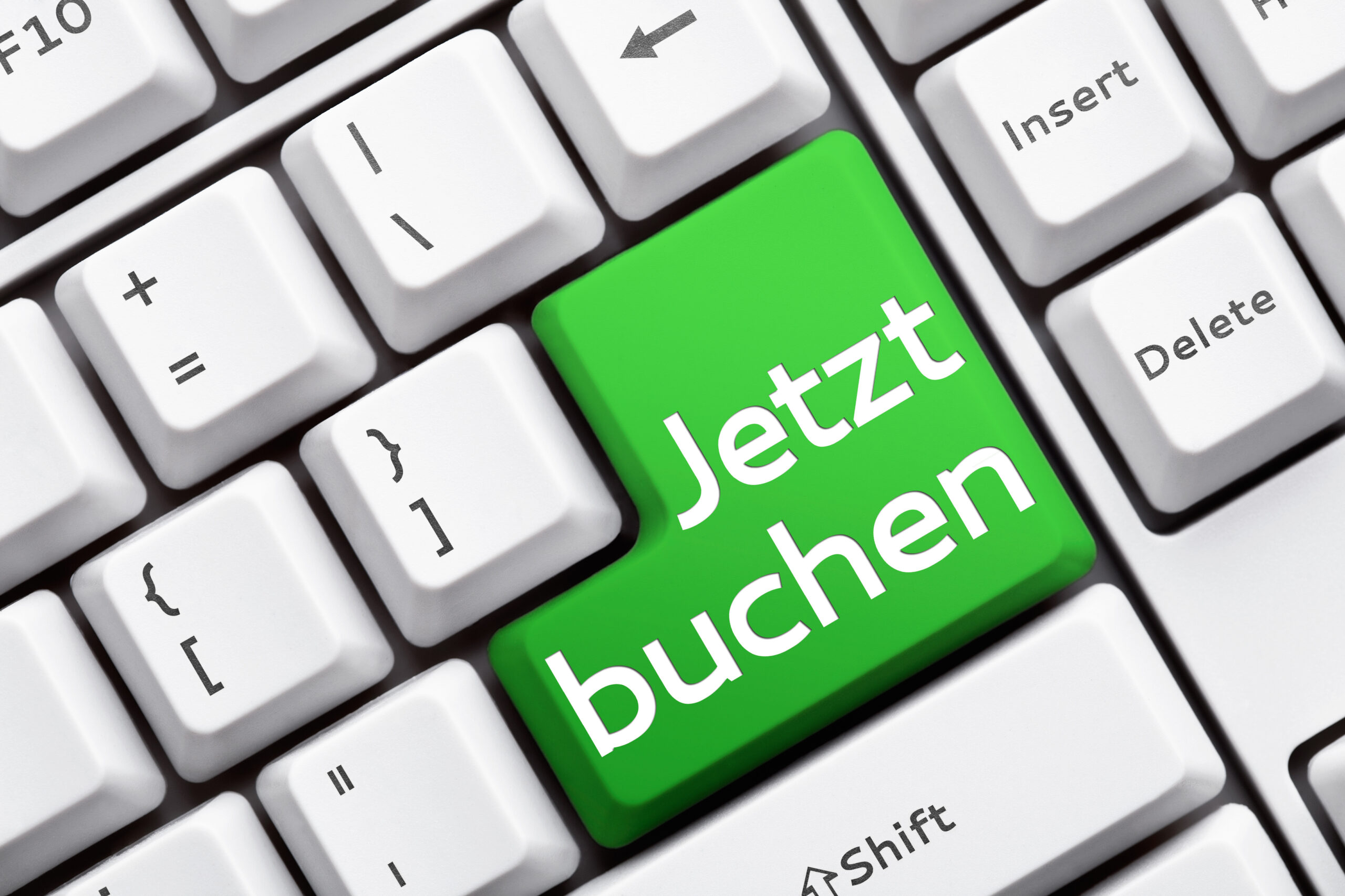 Button auf der Tastatur mit Jetzt buchen